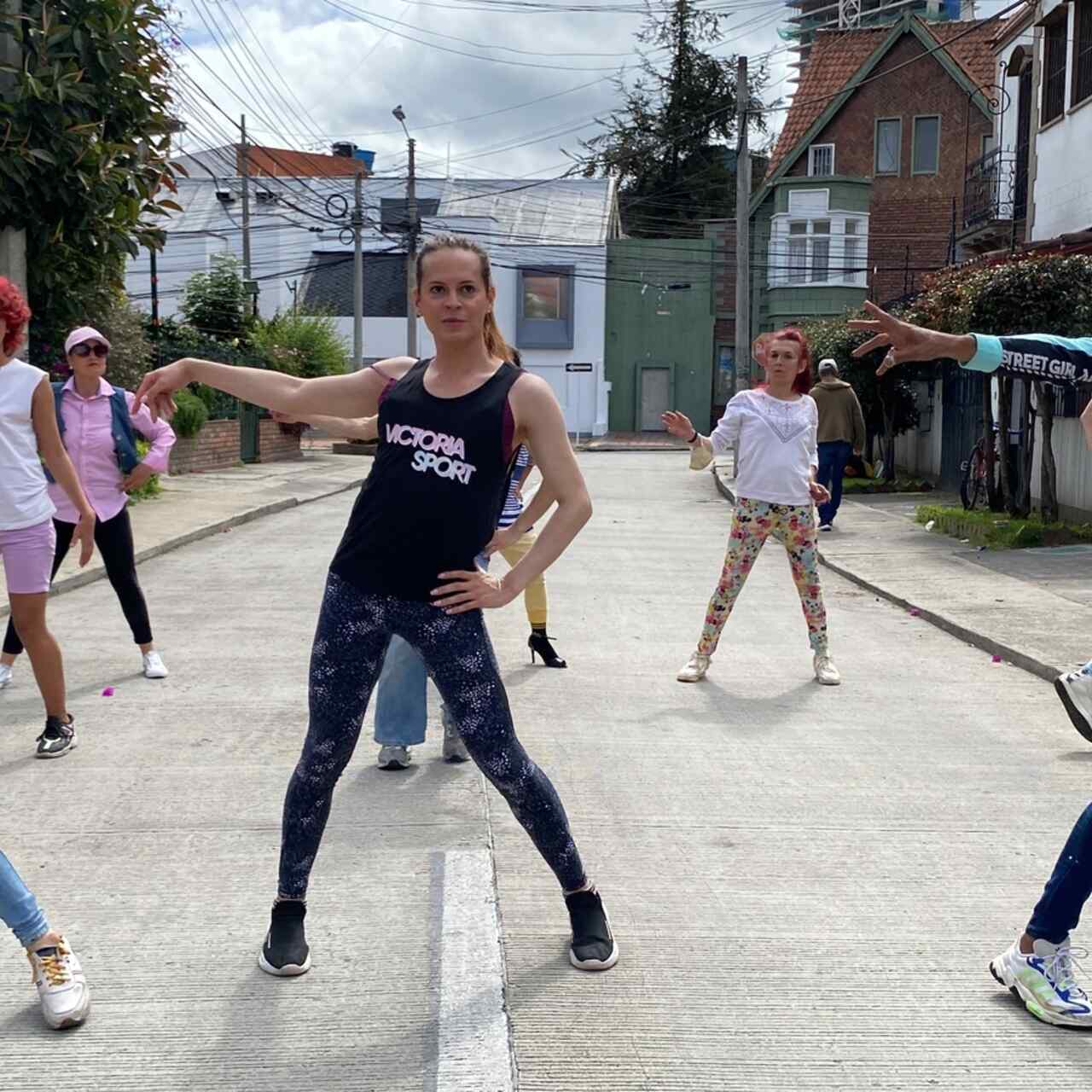 Candy and participants dance during a Danza Cabaret class.